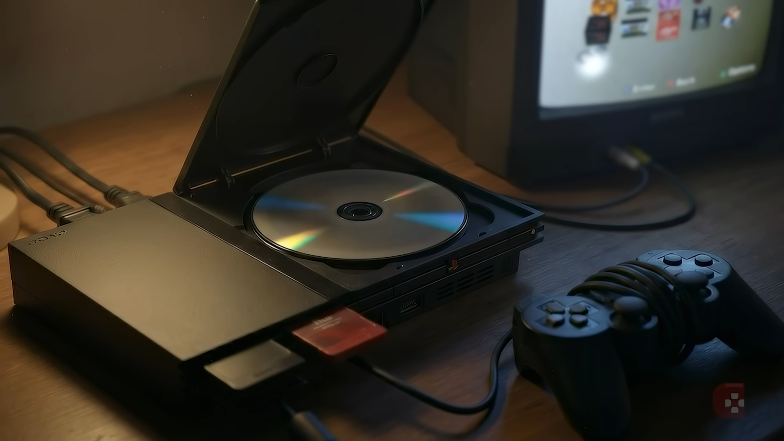 Animação detalhando o mecanismo do PS2 Slim arranhando disco pelo cabo solto