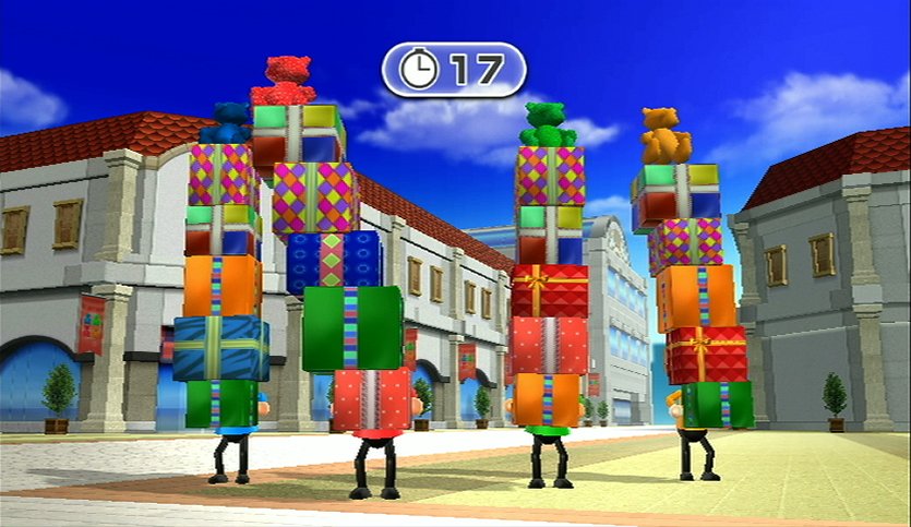 Quatro personagens Mii equilibram pilhas de presentes coloridos em um minigame de Wii Party