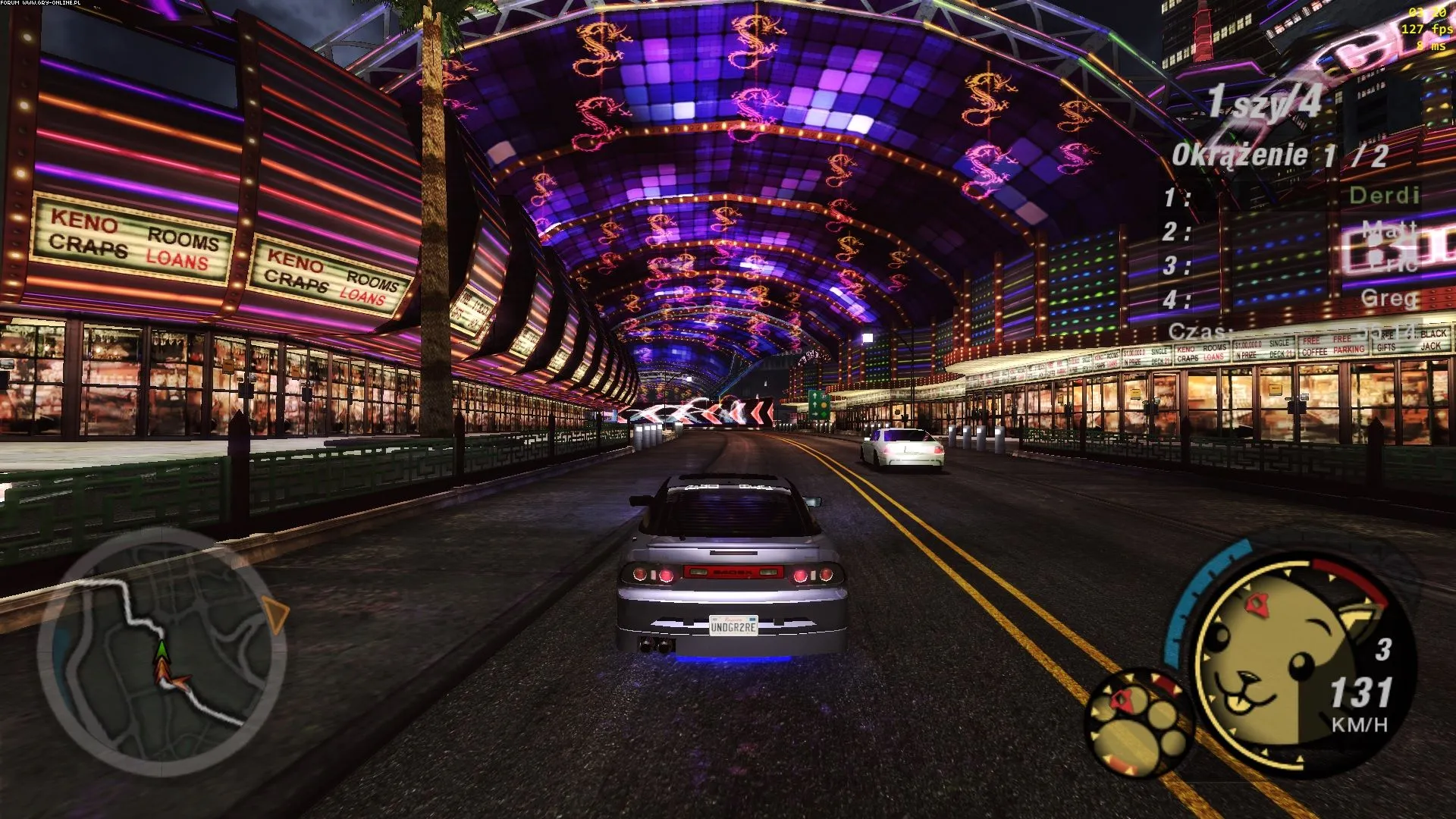 Corrida em cenário iluminado de Need for Speed Underground 2